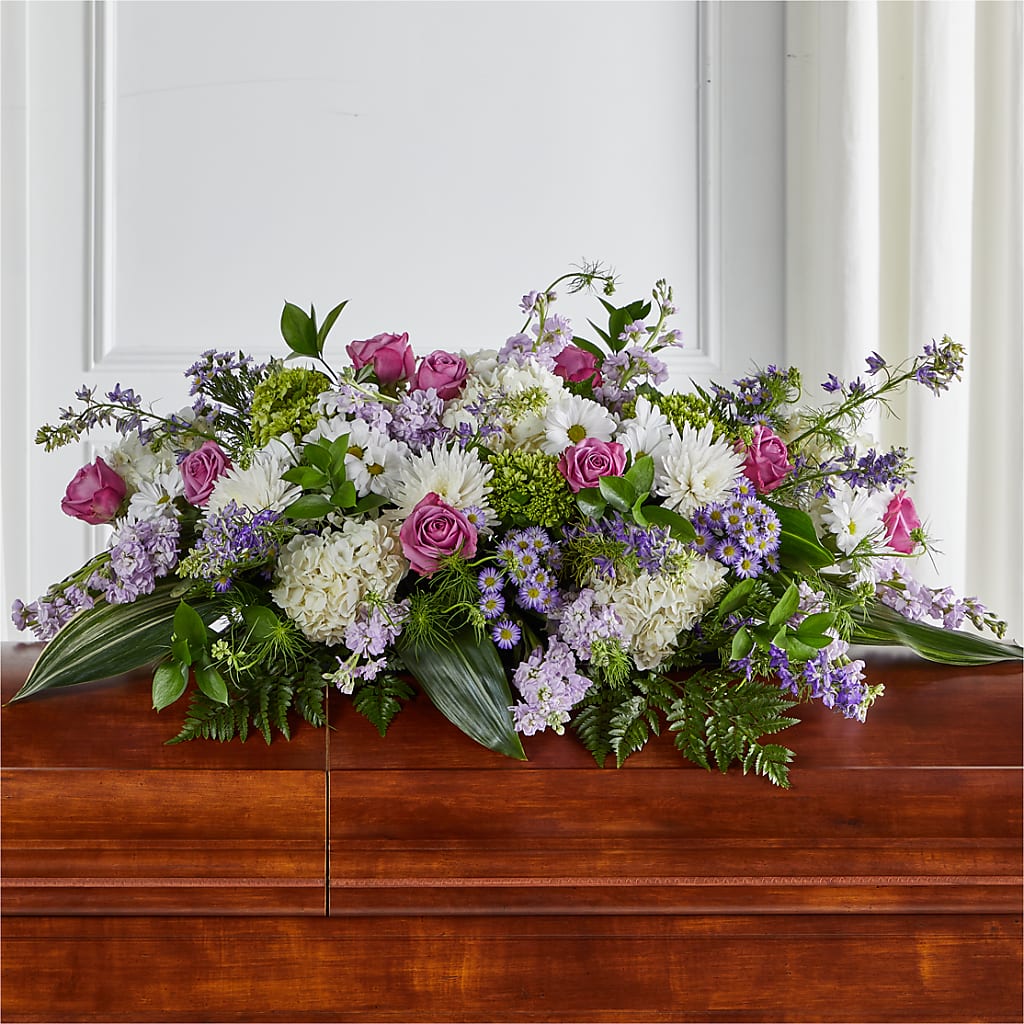 Meadows of Serenity Casket Spray – PIERSON'S FLOWER SHOP & GREENHOUSES INC, Cedar Rapids IA